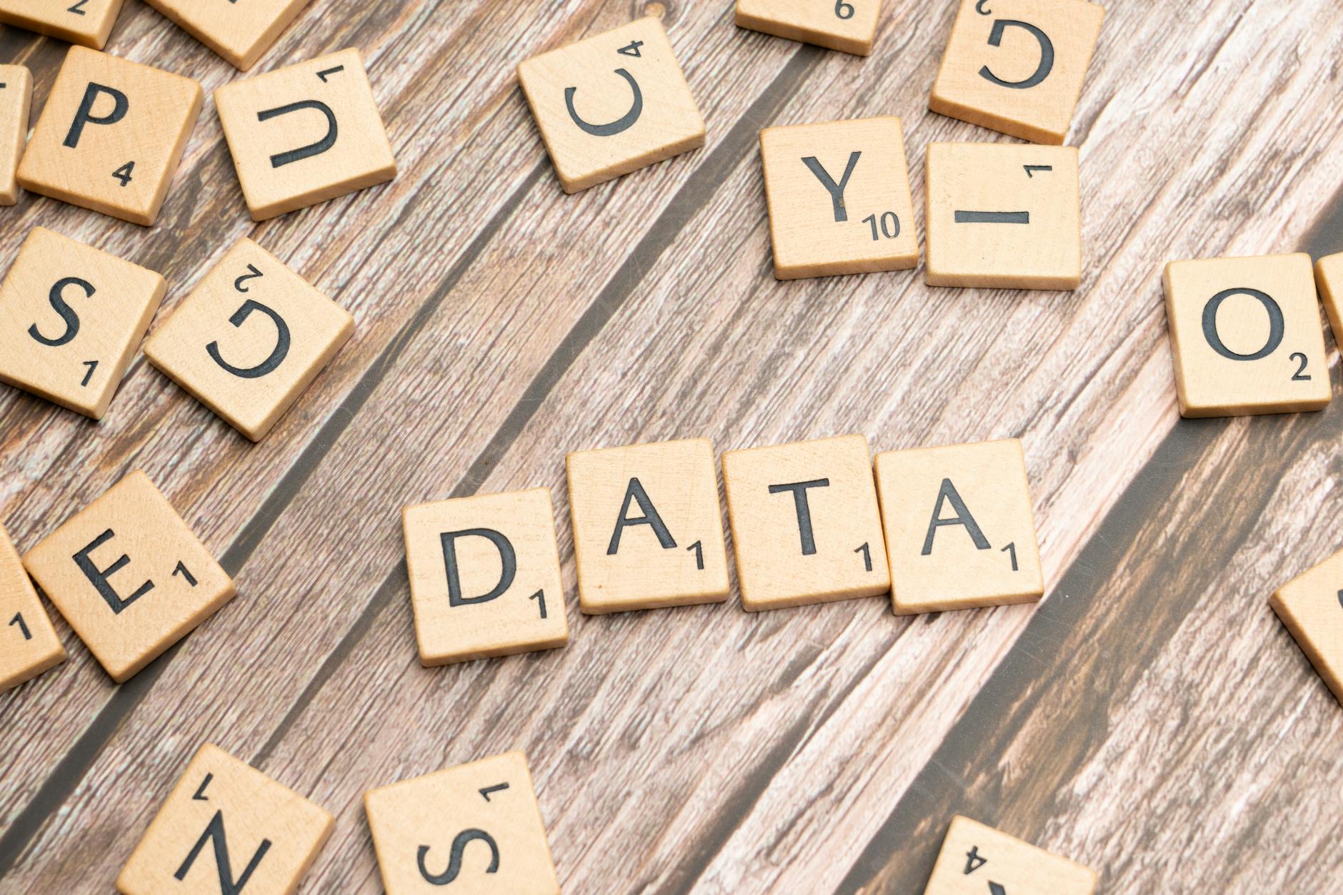the word data spelled out in scrabble letters